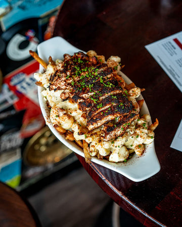 Blackened Chicken Alfredo Poutine (Jan. 15-21)